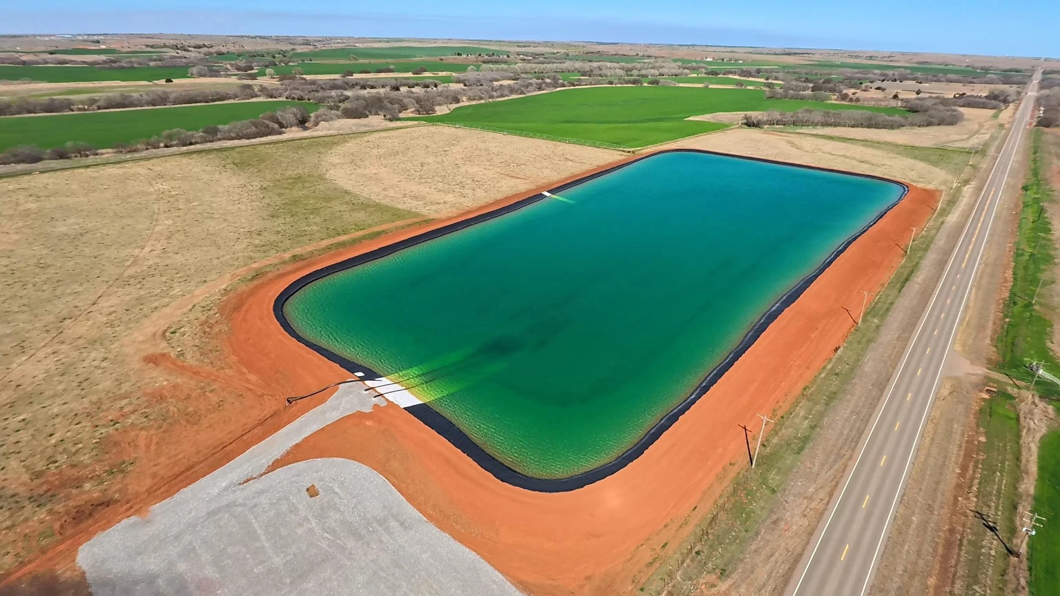 Aerial view of Trident Water Pit #1 and its lined storage reservoir