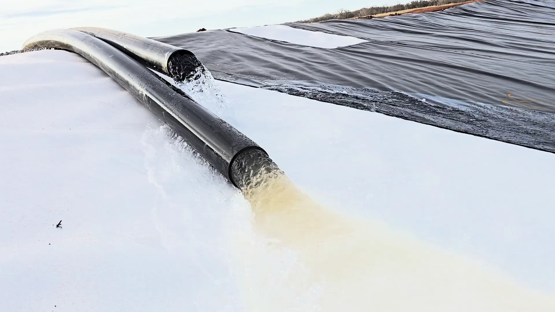 Water flowing from the recharge lines into Trident Water Pit #1